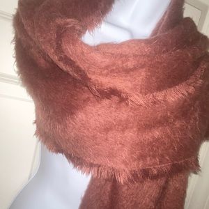 Women’s soft maroon color fuzzy scarf. NWOT